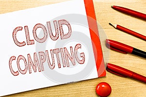 Handwriting text writing Cloud Computing. Concept meaning use a network of remote servers hosted on the Internet