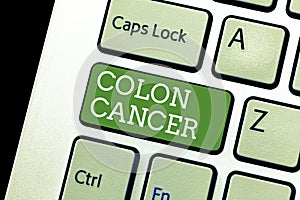 Handwriting text writing Colon Cancer. Concept meaning Cancer that forms in the tissues of the large intestine