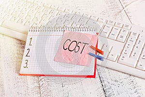 Handwriting text writing Cost. Concept meaning The amount that usualy paid for a item you buy or hiring a demonstrating