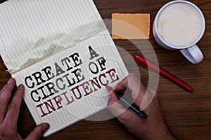 Handwriting text writing Create A Circle Of Influence. Concept meaning Be an influencer leader motivate other people Sticky note r