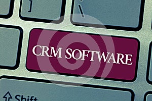 Handwriting text writing Crm Software. Concept meaning Customer relationship analysisagement used to engage with customers