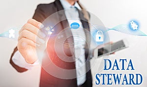 Handwriting text writing Data Steward. Concept meaning responsible for utilizing an organization s is data governance photo