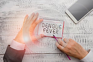 Handwriting text writing Dengue Fever. Concept meaning infectious disease caused by a flavivirus or aedes mosquitoes. photo