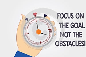 Handwriting text writing Focus On The Goal Not The Obstacles. Concept meaning Be determined to accomplish objectives Hu