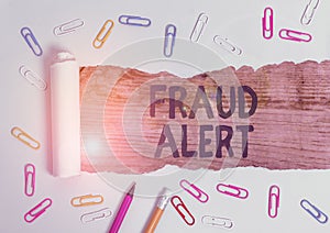 Handwriting text writing Fraud Alert. Concept meaning security alert placed on credit card account for stolen identity