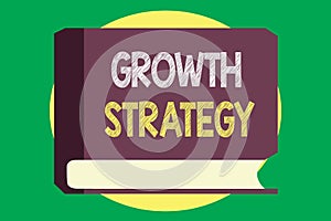 Handwriting text writing Growth Strategy. Concept meaning Strategy aimed at winning larger market share in shortterm photo
