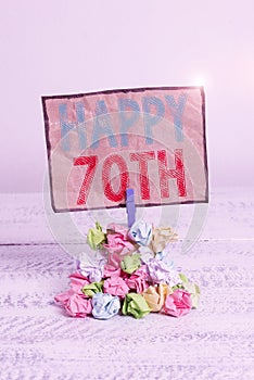 Handwriting text writing Happy 70Th. Concept meaning a joyful occasion for special event to mark the 70th year Reminder