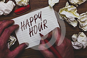 Handwriting text writing Happy Hour. Concept meaning Spending time for activities that makes you relax for a while Man holding mar