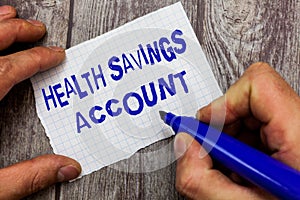 Handwriting text writing Health Savings Account. Concept meaning users with High Deductible Health Insurance Policy