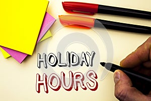 Handwriting text writing Holiday Hours. Concept meaning Celebration Time Seasonal Midnight Sales Extra-Time Opening written by Mar