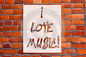 Handwriting text writing I Love Music. Concept meaning Having affection for good sounds lyric singers musicians Brick