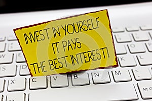 Handwriting text writing Invest In Yourself It Pays The Best Interest. Concept meaning Nurture oneself Plan the future