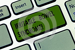 Handwriting text writing Irritable Bowel Syndrome. Concept meaning Disorder involving abdominal pain and diarrhea Keyboard key