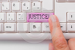 Handwriting text writing Justice. Concept meaning impartial adjustment of conflicting claims or assignments White pc