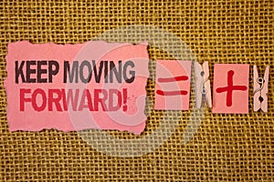 Handwriting text writing Keep Moving Forward Motivational Call. Concept meaning Optimism Progress Persevere Move Jute sacks plus t