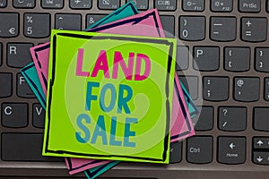 Handwriting text writing Land For Sale. Concept meaning Real Estate Lot Selling Developers Realtors Investment Papers