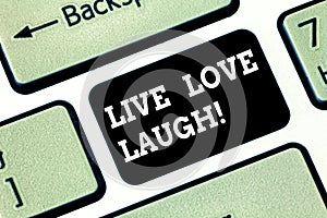 Handwriting text writing Live Love Laugh. Concept meaning Be inspired positive enjoy your days laughing good humor Keyboard key