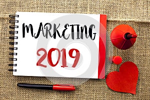 Handwriting text writing Marketing 2019. Concept meaning New Yea