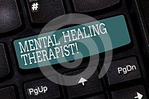 Handwriting text writing Mental Healing Therapist. Concept meaning Counseling or treating clients with mental disorder Keyboard