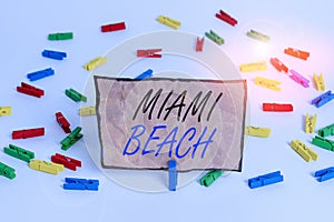 Handwriting text writing Miami Beach. Concept meaning the coastal resort city in MiamiDade County of Florida Colored photo