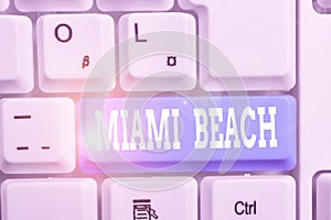 Handwriting text writing Miami Beach. Concept meaning the coastal resort city in MiamiDade County of Florida White pc