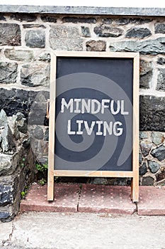 Handwriting text writing Mindful Living. Concept meaning Fully aware and engaged on something Conscious and Sensible