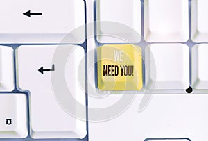 Handwriting text writing We Need You. Concept meaning asking someone to work together for certain job or target White pc