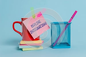 Handwriting text writing Offline Integration. Concept meaning First Triad of Marketing Television Print and Outdoor Cup photo
