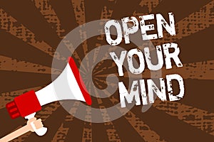Handwriting text writing Open Your Mind. Concept meaning Be open-minded Accept new different things ideas situations Man holding m