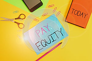 Handwriting text writing Pay Equity. Concept meaning eliminating sex and race discrimination in wage systems Paper
