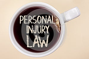 Handwriting text writing Personal Injury Law. Concept meaning guarantee your rights in case of hazards or risks written on Tea in