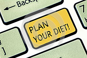 Handwriting text writing Plan Your Diet. Concept meaning Schedule fitness activities and meals to lose weight Keyboard