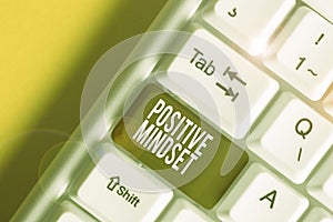 Handwriting text writing Positive Mindset. Concept meaning mental attitude in wich you expect favorable results White pc