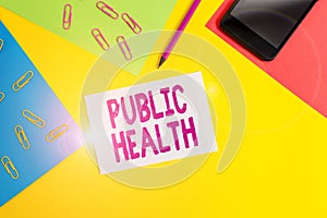 Handwriting text writing Public Health. Concept meaning government protection and improvement of community health Paper sheets