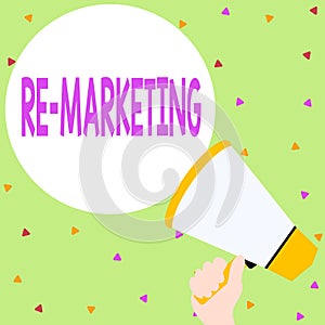 Handwriting text writing Re Marketing. Concept meaning Strategy to reach potential customers in your website Hand