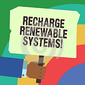 Handwriting text writing Recharge Renewable Systems. Concept meaning Clean and sustainable energy and nonpolluting Hu photo