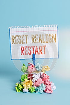 Handwriting text writing Reset Realign Restart. Concept meaning Life audit will help you put things in perspectives Reminder pile photo