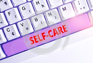 Handwriting text writing Self Care. Concept meaning practice of taking action preserve or improve ones own health White