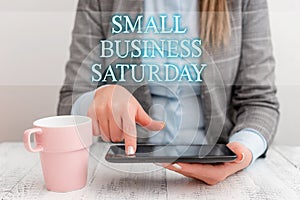 Handwriting text writing Small Business Saturday. Concept meaning American shopping holiday held during the Saturday photo