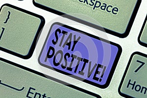 Handwriting text writing Stay Positive. Concept meaning Be Optimistic Motivated Good Attitude Inspired Hopeful Keyboard