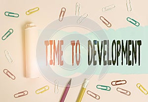 Handwriting text writing Time To Development. Concept meaning a length of time during which a company grows or develop