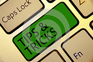 Handwriting text writing Tips and Tricks. Concept meaning Steps Lifehacks Handy advice Recommendations Skills Keyboard green key I photo