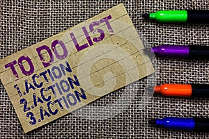 Handwriting text writing To Do List 1.Action 2.Action 3.Action. Concept meaning putting day priorities in order Paperboard compute