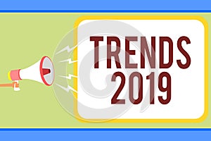 Handwriting text writing Trends 2019. Concept meaning Upcoming year prevailing tendency Widely Discussed Online Man holding megaph