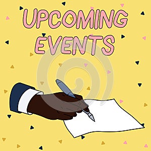 Handwriting text writing Upcoming Events. Concept meaning the approaching planned public or social occasions Male Hand