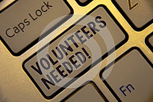 Handwriting text writing Volunteers Needed Motivational Call. Concept meaning Social Community Charity Volunteerism Golden keyboar