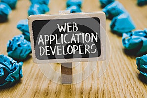 Handwriting text writing Web Application Developers. Concept meaning Internet programming experts Technology software