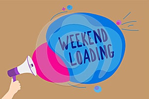 Handwriting text writing Weekend Loading. Concept meaning Starting Friday party relax happy time resting Vacations Man holding Meg