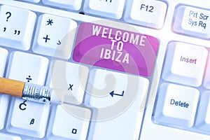 Handwriting text writing Welcome To Ibiza. Concept meaning Warm greetings from one of Balearic Islands of Spain White pc