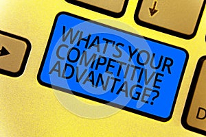 Handwriting text writing What s is Your Competitive Advantage question. Concept meaning Marketing strategy Plan Keyboard blue key